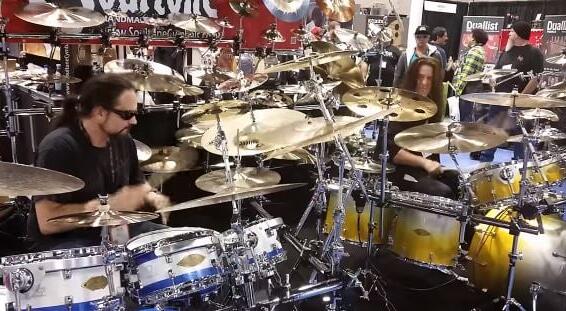 Former MEGADETH Drummers NICK MENZA And SHAWN DROVER Team Up For Side-By-Side Jam At NAMM (Video)